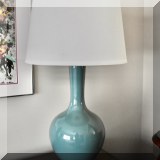 D08. One of a pair of glass lamps. 